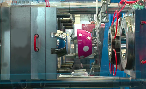 Injection molding machine producing plastic parts Injection molding machine producing plastic parts
